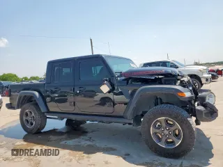 2023 Jeep Gladiator Rubicon with VIN 1C6JJTBG6PL524721, listed as a Copart auction lot 59091505 with 45,107 mi miles and Salvage title. Bid and sale history available at DreamBid. Image 4.