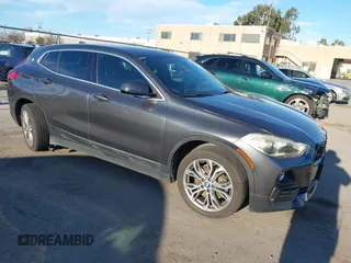 2018 BMW X2 xDrive28i z VIN WBXYJ5C31JEF73017, wystawiony jako IAAI lot #41330406 z przebiegiem 109 159 mil mil oraz . Historia ofert i sprzedaży dostępna na DreamBid. Obrazek 1.