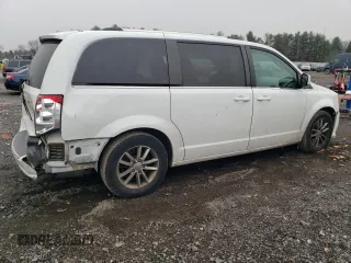 2018 Dodge Grand Caravan SXT z VIN 2C4RDGCG9JR133702, wystawiony jako Copart lot #85824554 z przebiegiem 140 881 mil mil oraz Szkoda całkowita • Salvage title. Historia ofert i sprzedaży dostępna na DreamBid. Obrazek 3.