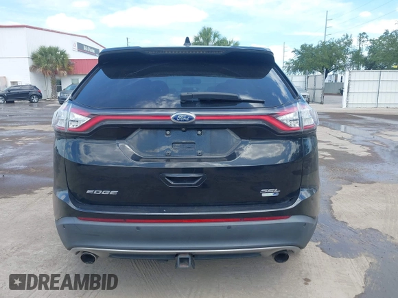 2015 Ford Edge SEL with VIN 2FMTK4J90FBB02669, listed as a IAAI auction lot 42176184 with 213,465 mi miles. Bid and sale history available at carsss.com. Image 16.