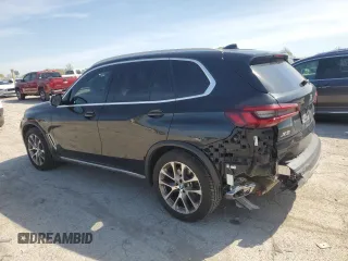 2021 BMW X5 xDrive40i с VIN 5UXCR6C06M9E80968, выставлен на аукционе Copart как лот 54848645 с пробегом 52 033 миль миль и Списание • Salvage title. История ставок и продаж доступна на DreamBid. Изображение 2.