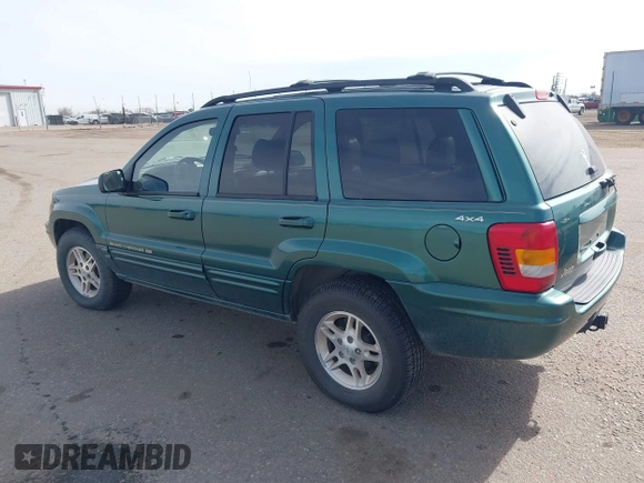 1999 Jeep Grand Cherokee Limited with VIN 1J4GW68N4XC544651, listed as a IAAI auction lot 41742346 with 94,904 mi miles and . Bid and sale history available at DreamBid. Image 3.