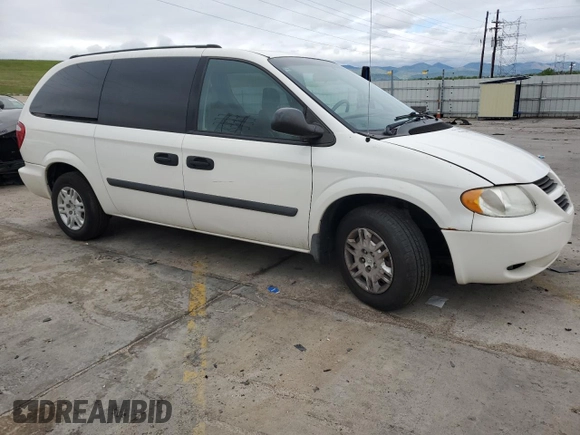 2005 Dodge Caravan SE with VIN 1D4GP24R45B273262, listed as a Copart auction lot 59026005 with 215,054 mi miles and Salvage title. Bid and sale history available at DreamBid. Image 4.