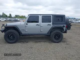 2018 Jeep Wrangler Unlimited Sport S with VIN 1C4BJWDG4JL861052, listed as a IAAI auction lot 42100517 with 43,907 mi miles and . Bid and sale history available at DreamBid. Image 15.