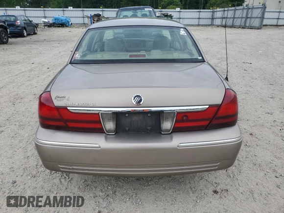 2005 Mercury Grand Marquis LS Premium z VIN 2MEFM75W15X660639, wystawiony jako Copart lot #56580605 z przebiegiem 149 136 mil mil oraz Szkody całkowita. Historia ofert i sprzedaży dostępna na DreamBid. Obrazek 6.