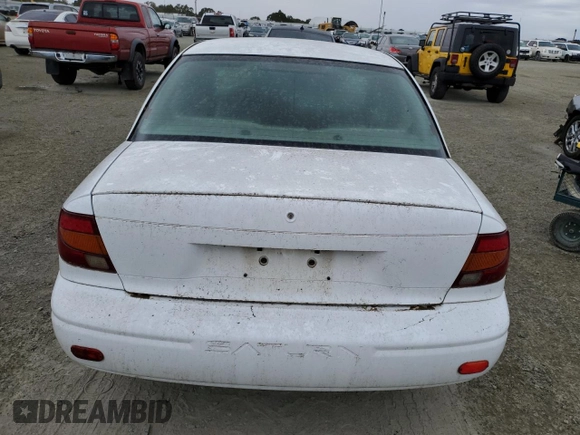 2001 Saturn SL with VIN 1G8ZF52891Z237485, listed as a Copart auction lot 76174574 with 130,525 mi miles and Salvage title. Bid and sale history available at DreamBid. Image 6.