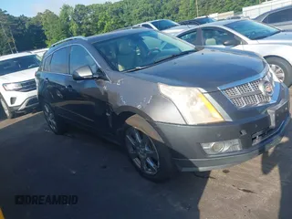 2010 Cadillac SRX Premium Collection z VIN 3GYFNFEY6AS502562, wystawiony jako IAAI lot #42551257 z przebiegiem 181 373 mil mil oraz . Historia ofert i sprzedaży dostępna na DreamBid. Obrazek 1.