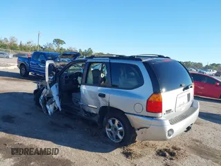 2008 GMC Envoy SLE2 with VIN 1GKDS13S082141895, listed as a IAAI auction lot 41596735 with 174,914 mi miles. Bid and sale history available at carsss.com. Image 3.