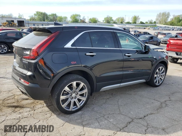 2019 Cadillac XT4 FWD Premium Luxury z VIN 1GYFZCR4XKF100124, wystawiony jako Copart lot #54249845 z przebiegiem 39 644 mil mil oraz Szkoda całkowita • Salvage title. Historia ofert i sprzedaży dostępna na DreamBid. Obrazek 3.