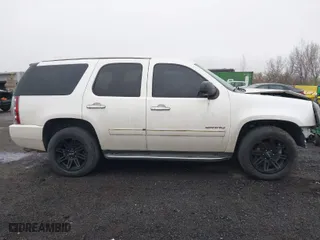 2011 GMC Yukon Denali with VIN 1GKS2EEFXBR137172, listed as a IAAI auction lot 41930576 with 117,246 mi miles. Bid and sale history available at carsss.com. Image 13.