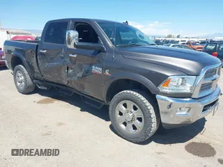 2017 Ram 2500 Laramie with VIN 3C6UR5FL4HG570085, listed as a IAAI auction lot 42311474 with 74,579 mi miles and . Bid and sale history available at DreamBid. Image 1.