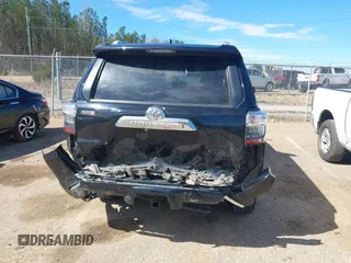 2014 Toyota 4Runner SR5 with VIN JTEZU5JR2E5074807, listed as a IAAI auction lot 41730326 with 144,383 mi miles and . Bid and sale history available at DreamBid. Image 6.