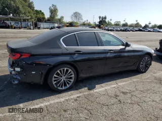 2023 BMW 5 Series 530i with VIN WBA53BH05PCM01563, listed as a Copart auction lot 55525515 with 23,371 mi miles and Salvage title. Bid and sale history available at DreamBid. Image 3.