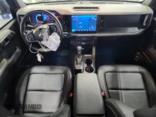 2023 Ford Bronco z VIN 1FMEE5DP9PLB54433, wystawiony jako Copart lot #60074335 z przebiegiem 23 709 mil mil oraz Szkoda całkowita • Salvage title. Historia ofert i sprzedaży dostępna na DreamBid. Obrazek 8.