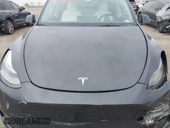 2024 Tesla Model Y Long Range z VIN 7SAYGDEEXRA226636, wystawiony jako IAAI lot #41622144 z przebiegiem 8 908 mil mil oraz . Historia ofert i sprzedaży dostępna na DreamBid. Obrazek 10.
