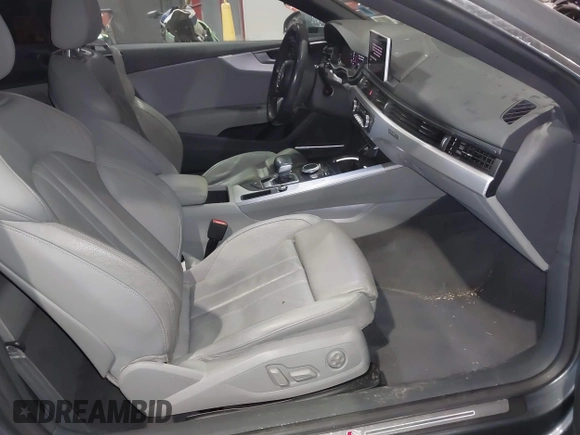 2018 Audi A5 Premium Plus with VIN WAUTNAF50JA011354, listed as a IAAI auction lot 41396659 with 74,936 mi miles and . Bid and sale history available at DreamBid. Image 5.