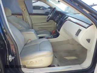 2008 Cadillac DTS 1SC with VIN 1G6KD57Y18U195569, listed as a IAAI auction lot 41936784 with 123,924 mi miles and . Bid and sale history available at carsss.com. Image 5.