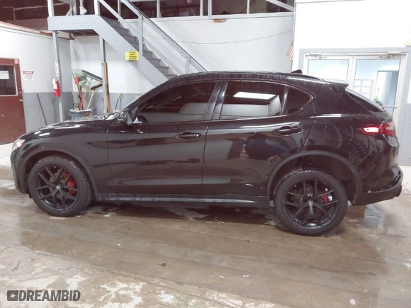 2019 Alfa Romeo Stelvio Ti Sport with VIN ZASPAKBN5K7C41649, listed as a IAAI auction lot 40908984 with 61,320 mi miles. Bid and sale history available at carsss.com. Image 14.
