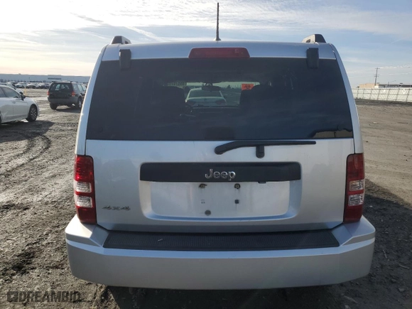 2009 Jeep Liberty Sport with VIN 1J8GN28K19W548688, listed as a Copart auction lot 46870705 with 104,427 mi miles and Salvage Title. Bid and sale history available at carsss.com. Image 6.