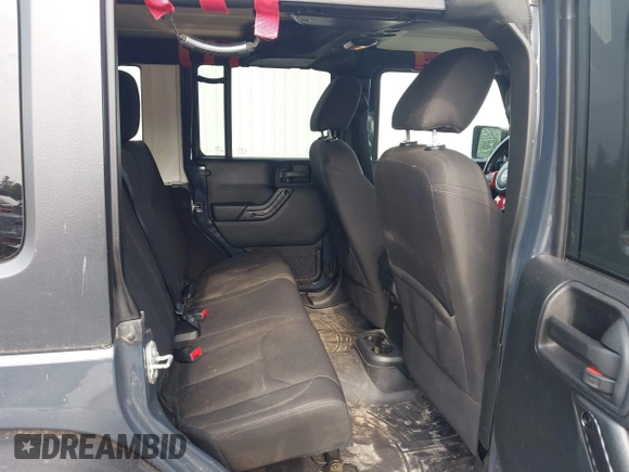 2016 Jeep Wrangler Unlimited Sport z VIN 1C4BJWDG4GL226180, wystawiony jako IAAI lot #42419561 z przebiegiem 76 522 mil mil oraz . Historia ofert i sprzedaży dostępna na DreamBid. Obrazek 8.