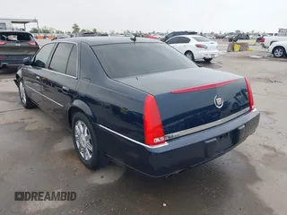 2008 Cadillac DTS 1SC with VIN 1G6KD57Y98U173996, listed as a IAAI auction lot 41932567 with 89,309 mi miles and . Bid and sale history available at carsss.com. Image 3.