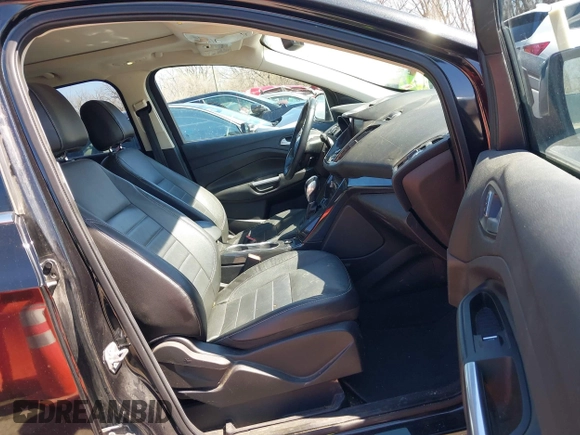 2014 Ford Escape Titanium with VIN 1FMCU0JX1EUE12260, listed as a IAAI auction lot 41826246 with 178,532 mi miles. Bid and sale history available at carsss.com. Image 5.