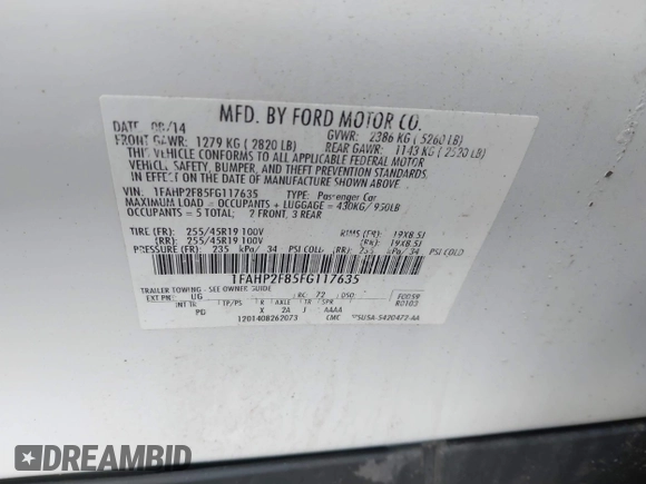 2015 Ford Taurus Limited with VIN 1FAHP2F85FG117635, listed as a IAAI auction lot 41979311 with 104,314 mi miles. Bid and sale history available at carsss.com. Image 9.