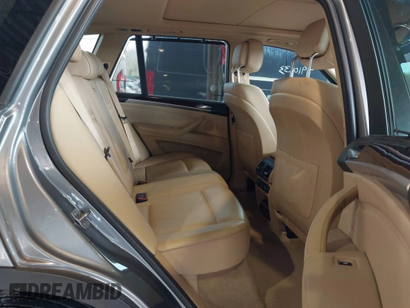 2012 BMW X5 35d with VIN 5UXZW0C59CL673416, listed as a IAAI auction lot 41910233 with 70,008 mi miles and . Bid and sale history available at DreamBid. Image 8.