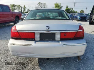 2000 Mercury Grand Marquis GS z VIN 2MEFM74W0YX715104, wystawiony jako Copart lot #54357855 z przebiegiem 111 231 mil mil oraz Szkoda całkowita • Salvage title. Historia ofert i sprzedaży dostępna na DreamBid. Obrazek 6.
