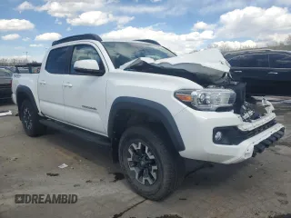 2018 Toyota Tacoma SR with VIN 5TFCZ5AN3JX128204, listed as a Copart auction lot 53970865 with 76,986 mi miles and Salvage Title. Bid and sale history available at DreamBid. Image 4.