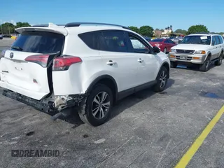 2018 Toyota RAV4 XLE with VIN JTMWFREV4JJ753365, listed as a IAAI auction lot 42550177 with 42,607 mi miles and . Bid and sale history available at DreamBid. Image 4.