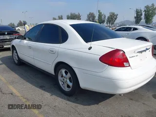 2003 Ford Taurus SES Standard with VIN 1FAFP55293G176494, listed as a IAAI auction lot 42040985 with 95,550 mi miles. Bid and sale history available at carsss.com. Image 3.