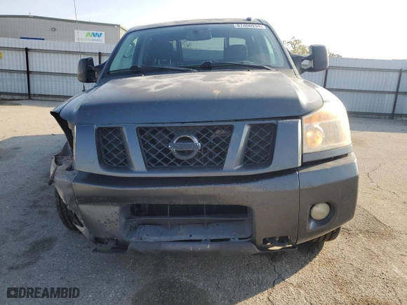 2010 Nissan Titan SE with VIN 1N6AA0EC5AN319917, listed as a Copart auction lot 87466934 with 263,042 mi miles and Salvage Title. Bid and sale history available at carsss.com. Image 5.