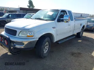 1997 Ford F-150 XL with VIN 1FTDX18W6VNB27227, listed as a IAAI auction lot 41858395 with 174,888 mi miles. Bid and sale history available at carsss.com. Image 2.