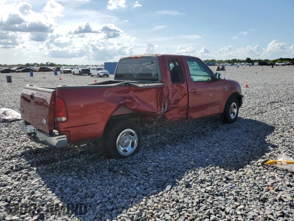 2000 Ford F-150 XL with VIN 1FTRX17W3YNB80866, listed as a Copart auction lot 61151005 with Not provided miles and Salvage title. Bid and sale history available at DreamBid. Image 3.