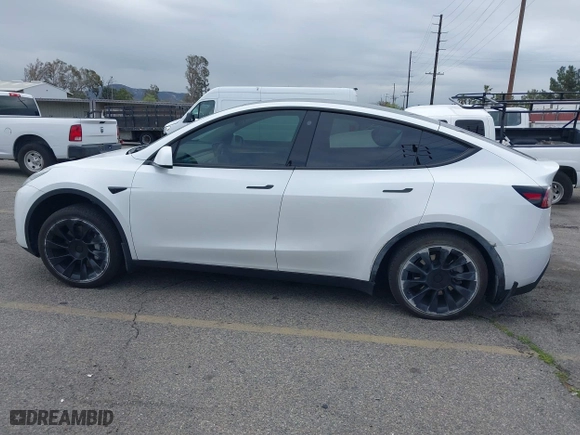 2023 Tesla Model Y Long Range with VIN 7SAYGDEE7PA023295, listed as a IAAI auction lot 41773783 with 28,079 mi miles. Bid and sale history available at carsss.com. Image 14.