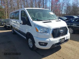 2021 Ford Transit Passenger XL with VIN 1FBAX2Y83MKA49312, listed as a IAAI auction lot 41806818 with 71,286 mi miles. Bid and sale history available at carsss.com. Image 1.