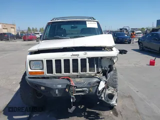 1998 Jeep Cherokee Sport with VIN 1J4FJ68S4WL227094, listed as a IAAI auction lot 42361950 with Not provided miles and . Bid and sale history available at DreamBid. Image 12.