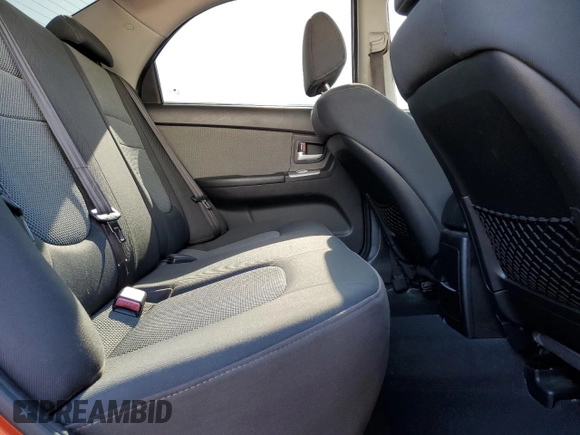 2009 Kia Spectra EX with VIN KNAFE222995027376, listed as a Copart auction lot 52406025 with 73,692 mi miles and Salvage Title. Bid and sale history available at DreamBid. Image 10.