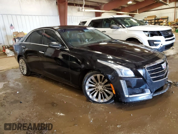 2015 Cadillac CTS Luxury AWD with VIN 1G6AX5SX8F0107476, listed as a Copart auction lot 47990175 with 144,934 mi miles and Clean title. Bid and sale history available at DreamBid. Image 4.