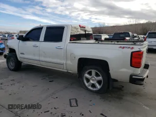 2014 Chevrolet Silverado 1500 High Country with VIN 3GCUKTEC4EG335555, listed as a Copart auction lot 86993214 with 216,596 mi miles and Salvage Title. Bid and sale history available at carsss.com. Image 2.