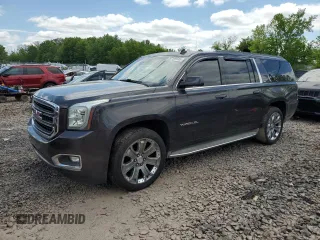 2015 GMC Yukon XL SLT z VIN 1GKS2HKC5FR121589, wystawiony jako Copart lot #57199505 z przebiegiem 200 753 mil mil oraz Szkoda całkowita • Salvage title. Historia ofert i sprzedaży dostępna na DreamBid. Obrazek 1.