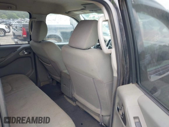 2015 Nissan Frontier S with VIN 1N6AD0EV2FN735908, listed as a IAAI auction lot 42388456 with 164,889 mi miles and . Bid and sale history available at DreamBid. Image 8.