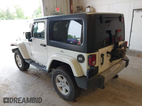 2015 Jeep Wrangler Sahara with VIN 1C4AJWBG7FL648621, listed as a IAAI auction lot 42439781 with 107,148 mi miles and . Bid and sale history available at DreamBid. Image 3.
