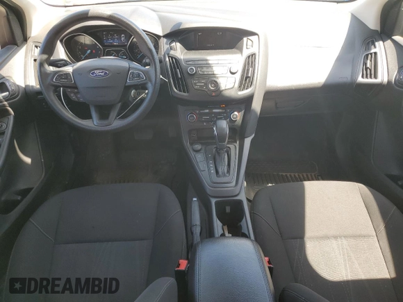 2018 Ford Focus SE z VIN 1FADP3FE1JL246725, wystawiony jako Copart lot #57913225 z przebiegiem 52 247 mil mil oraz Czysty tytuł • Clean title. Historia ofert i sprzedaży dostępna na DreamBid. Obrazek 8.