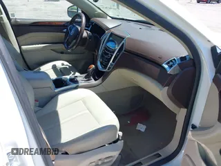 2016 Cadillac SRX Luxury Collection z VIN 3GYFNEE34GS513728, wystawiony jako IAAI lot #41847871 z przebiegiem 109 045 mil mil oraz . Historia ofert i sprzedaży dostępna na DreamBid. Obrazek 5.