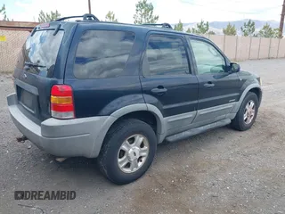 2001 Ford Escape XLT with VIN 1FMCU041X1KA93910, listed as a IAAI auction lot 42270271 with 151,166 mi miles and . Bid and sale history available at DreamBid. Image 4.