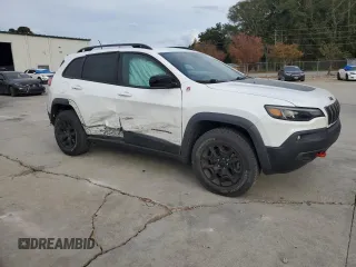 2022 Jeep Cherokee Trailhawk with VIN 1C4PJMBX4ND515208, listed as a Copart auction lot 78926024 with 94,116 mi miles and Salvage Title. Bid and sale history available at carsss.com. Image 4.