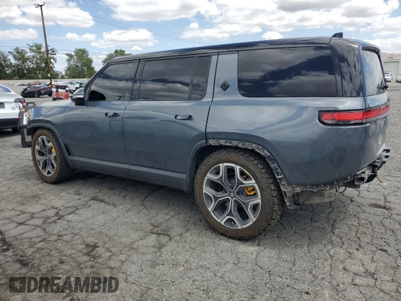 2022 Rivian R1S Launch Edition z VIN 7PDSGABL5NN001018, wystawiony jako Copart lot #56914725 z przebiegiem 26 156 mil mil oraz Szkoda całkowita • Salvage title. Historia ofert i sprzedaży dostępna na DreamBid. Obrazek 2.