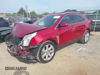 2015 Cadillac SRX Performance Collection z VIN 3GYFNCE37FS567267, wystawiony jako IAAI lot #42160129 z przebiegiem 144 948 mil mil oraz . Historia ofert i sprzedaży dostępna na DreamBid. Obrazek 2.